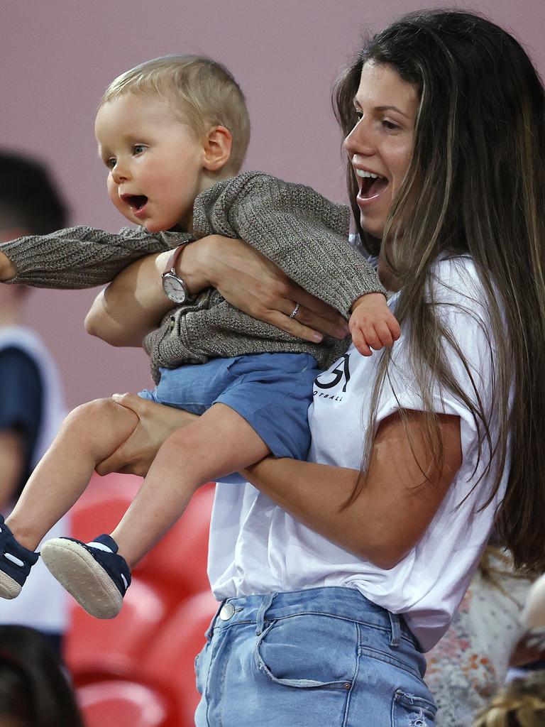 Jordan Ablett and Levi enjoying the footy. Pic: Michael Klein