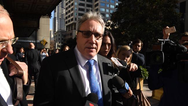 Australian Tax Office Deputy Commissioner Michael Cranston leaves the Downing Centre Courts in Sydney, Tuesday, June 13, 2017. Senior tax office official Michael Cranston has faced a NSW court over an unprecedented white-collar fraud scandal linked to his son and daughter. (AAP Image/Dean Lewins) NO ARCHIVING