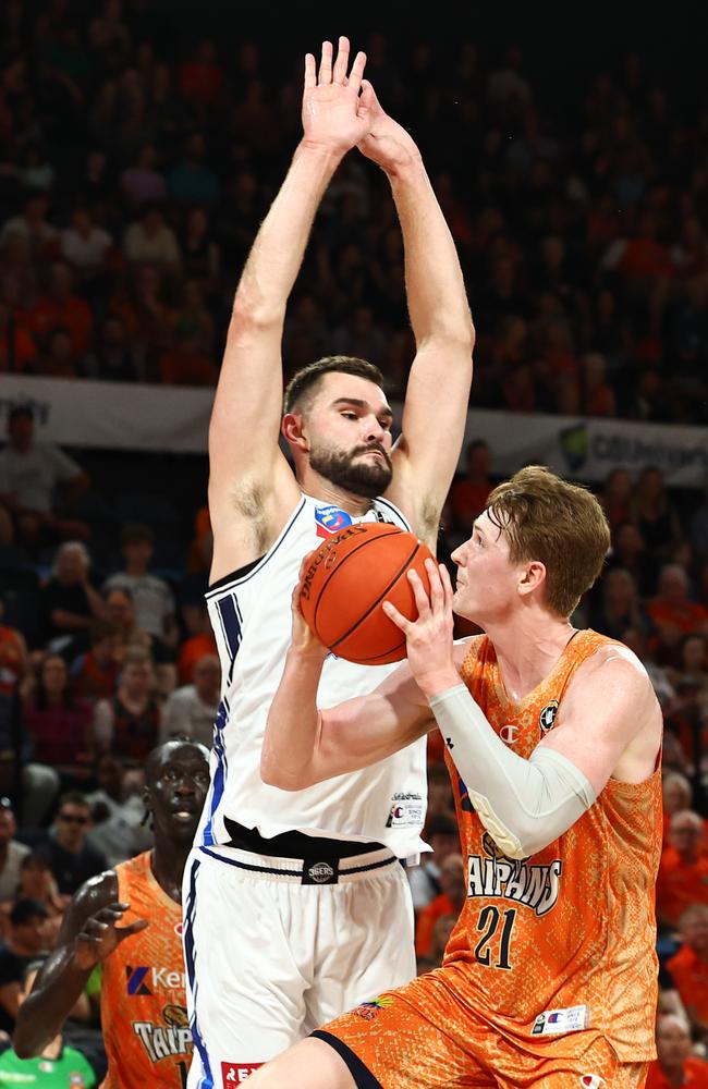 Taipans' Sam Waardenburg comes up against Adelaide's Isaac Humphries. Picture: Brendan Radke