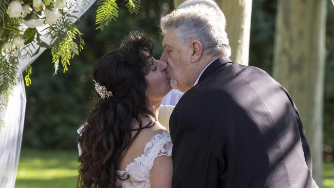 Chris Harwood marying his bride Rita Harwood-Romeo in the Rose Garden at Sunnybrae. Picture: Kelly Barnes