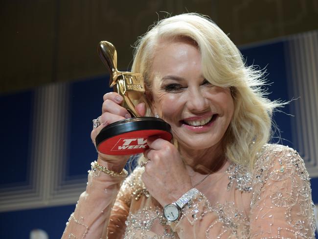 Kerri-Anne Kennerley poses for photographs with her Gold Logie for the TV Week Logie Hall of Fame. Picture: AAP