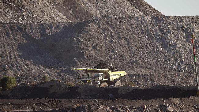 An open-cut mine in Singleton, where the local mayor fears a state government scheme could be cut. (Photo by William WEST / AFP)