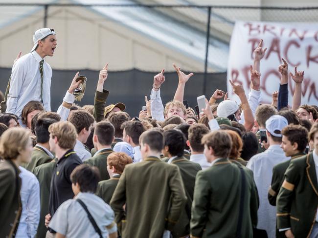 Trinity Grammar students protest over the sacking of Rohan Brown on Tuesday. Picture: Jake Nowakowski