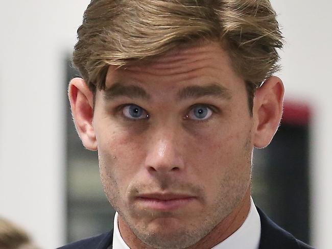 MELBOURNE, AUSTRALIA - MAY 08:  Tom Hawkins of the Geelong Cats leaves the AFL Tribunal at AFL House on May 8, 2018 in Melbourne, Australia.  The AFL Tribunal banned Geelong star Tom Hawkins for one week. Hawkins plead guilty to making intentional contact with umpire Dean Margetts during last Friday night's match against Greater Western Sydney.  (Photo by Scott Barbour/Getty Images)