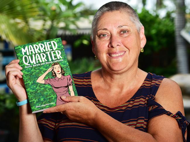 Maria Augustus-Dunn with copies of her book, Married Quarter. Picture: Shae Beplate.