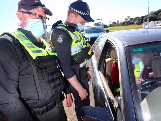 DSC Damian McKeegan and his son Constable Xavier McKeegan who are working a shift at the Little River checkpoint. picture: Glenn Ferguson