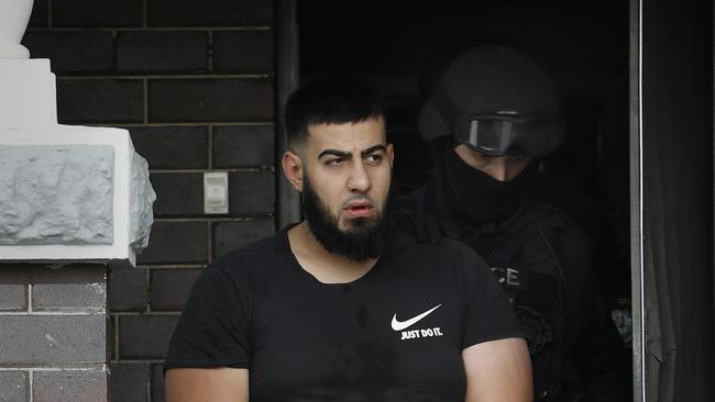 Omar Fawaz Mahfouz, then 27, is arrested at his Bankstown home Friday March 22, 2019, for his alleged role in a cocaine syndicate in Sydney. Pictures: Supplied