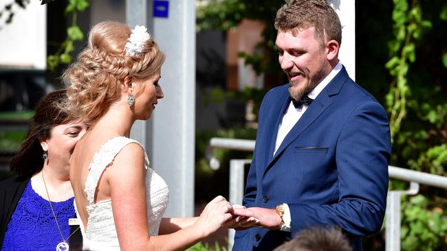 I do: Sarah Lake and Jason Lindsley, the victim of a vicious coward punch in 2012, wed yesterday, marking a new chapter in the couple’s lives. Picture: Bianca De Marchi