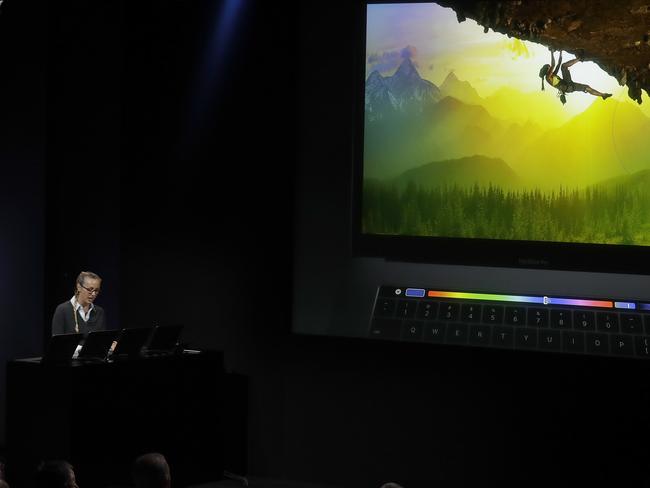 Bradee Evans, experience design manager at Adobe Photoshop, gives a demonstration of using Touch Bar.  Picture:  AP