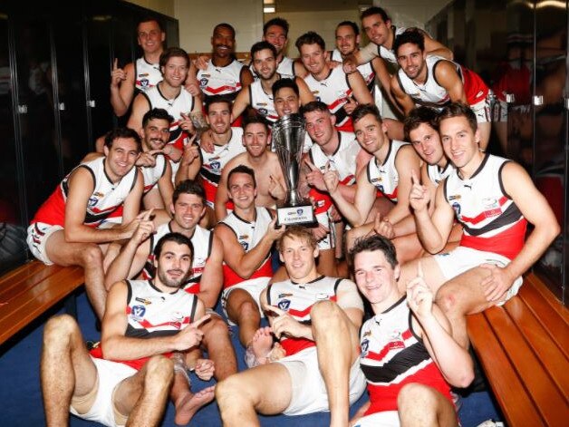 The Eastern Football League (EFL) celebrates its win over the Geelong Football League (GFL) in the AFL Victoria Community Championships. Picture: Garry Sparke