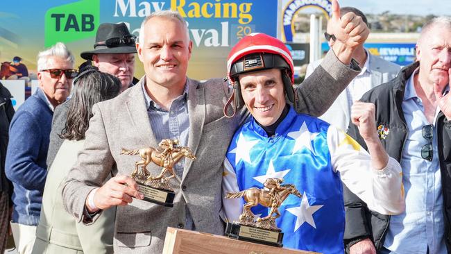McCarthy and trainer Andrew Bobbin with their Brierly trophies. Picture: George Sal/Racing Photos via Getty Images