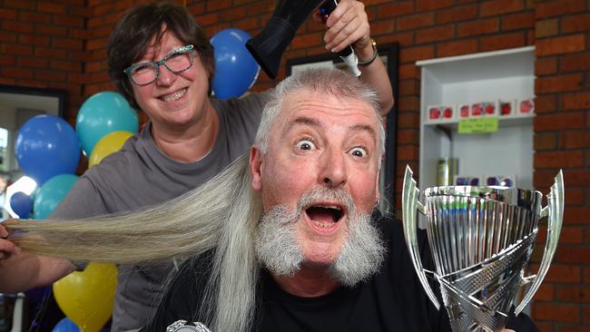 Heathmont's Paul Gee gets his mullet styled weekly by hairdresser Chris Dixon at The Head Shed in Heathmont Village. Picture: Josie Hayden