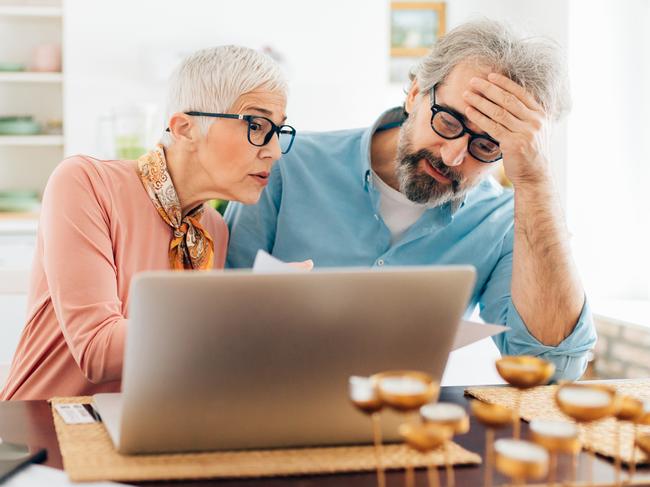 SENIOR/PENSIONER/MATURE/ELDERLY/OVER 65/GRANDPARENT/RETIREE/SUPERANNUATION. Picture: istock Senior couple calculating bills to pay