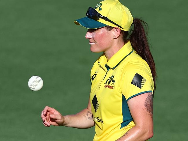 BRISBANE, AUSTRALIA - DECEMBER 05: Megan Schutt of Australia leaves the field after taking 5 wickets during game one of the Women's One Day International Series between Australia and India at Allan Border Field on December 05, 2024 in Brisbane, Australia. (Photo by Chris Hyde/Getty Images)