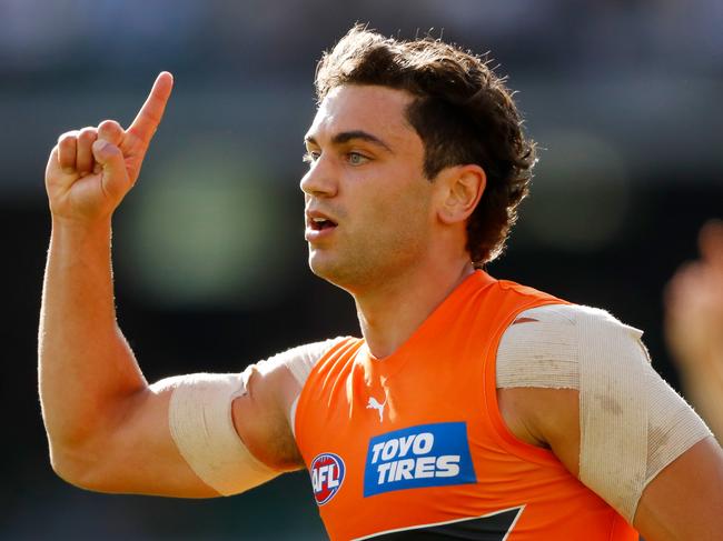 MELBOURNE, AUSTRALIA - MARCH 27: Tim Taranto of the Giants celebrates a goal during the 2022 AFL Round 02 match between the Richmond Tigers and the GWS Giants at the Melbourne Cricket Ground on March 27, 2022 In Melbourne, Australia. (Photo by Dylan BurnsAFL Photos)