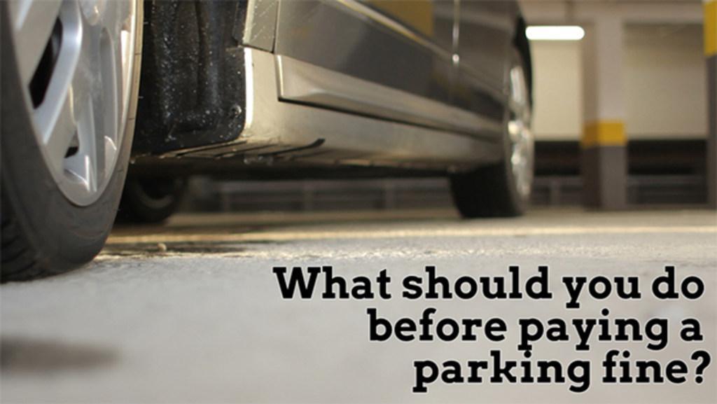 What should you do before paying a parking fine?