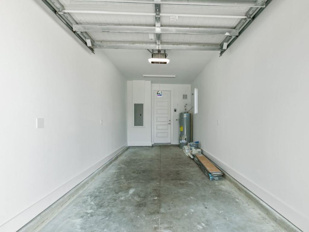 The garage is perfect for your … Vespa? Picture: Rick Casto for Ryan Wetherhold/Oceanside Real Estate