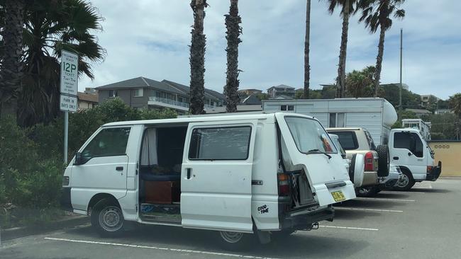 A campervan parked in the car park at Freshwater Beach. Picture: Jim O'Rourke