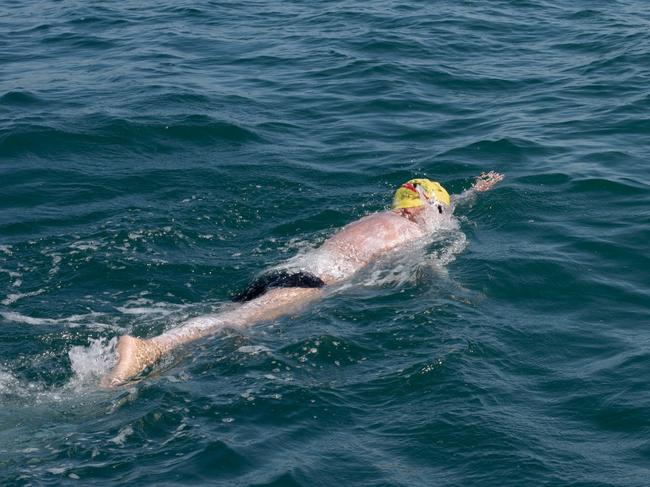 Daryl Cygler during the English channel swim between the UK and France. Emma Khan Photography Ltd