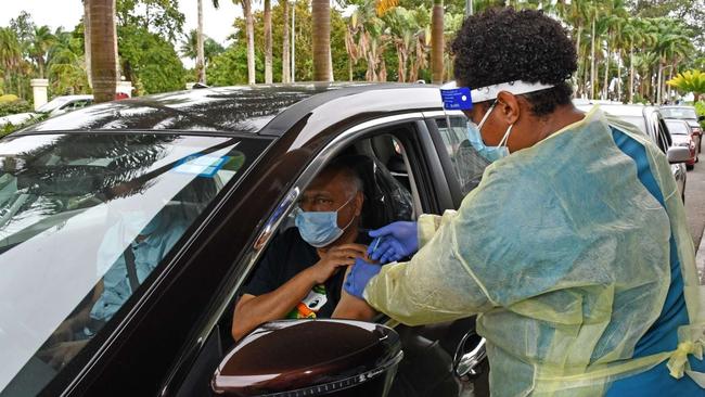 Locals wait in line to be vaccinated with the AstraZeneca vaccine at a drive-through in Albert Park in Suva, Fiji. Picture: Supplied