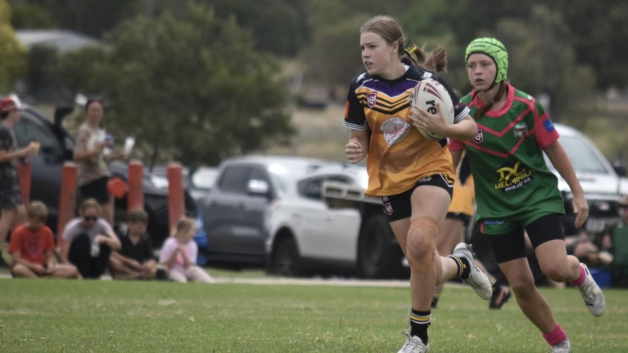 Bridie Sabburg on the run for the Gatton Hawks