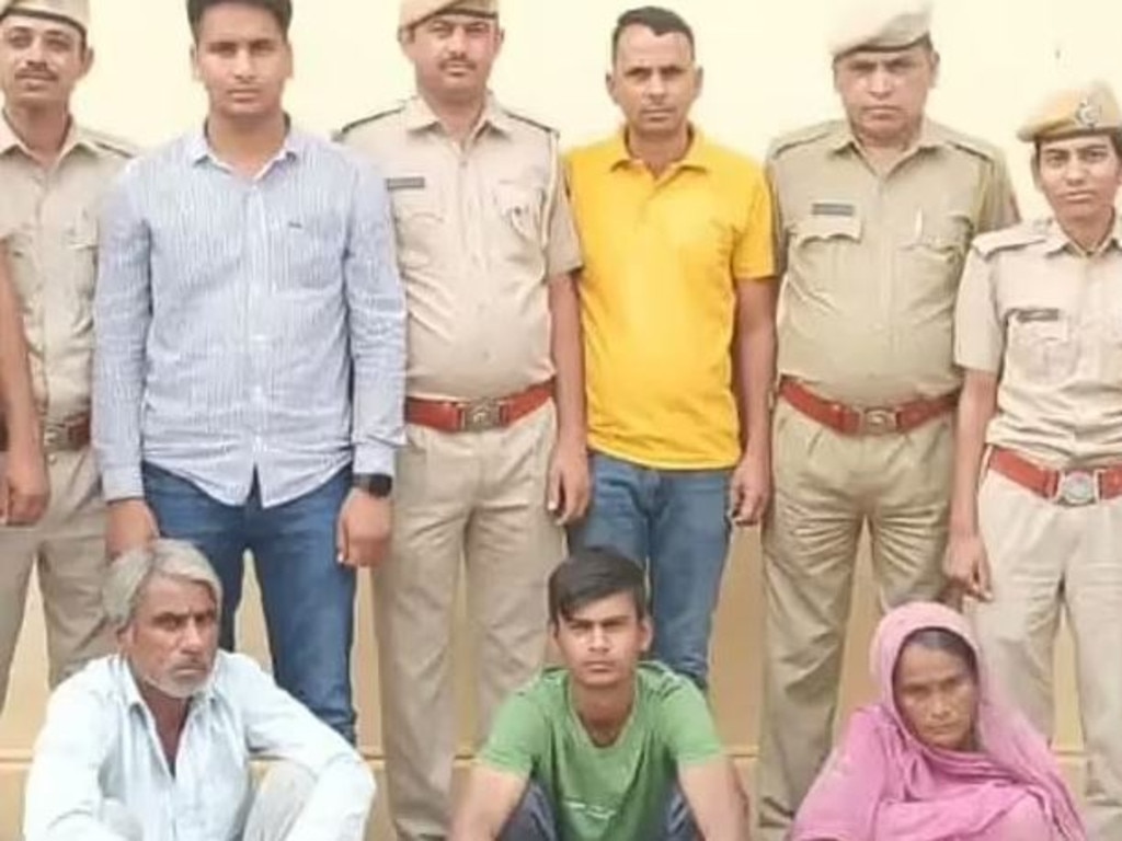 Rajput (centre) after being detained with his parents. Picture: Twitter