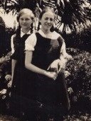 Judith with her friend Joyce Noad at Meriden Anglica School for Girls in 1931.