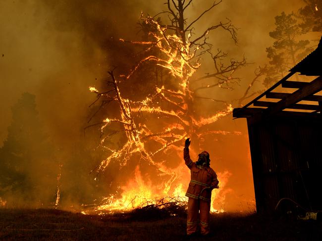 A fire approaches a property in Bilpin in December. Picture: Jeremy Piper