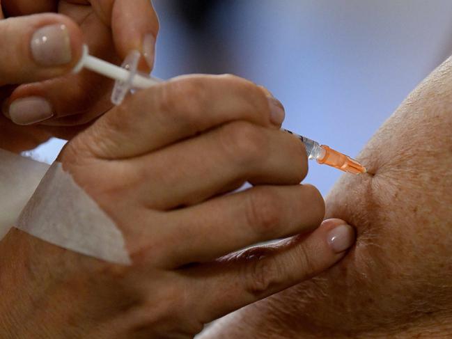 SYDNEY, AUSTRALIA - NewsWire Photos FEBRUARY, 22, 2021: Residents are seen receiving their first dosage of the Pfizer COVID-19 vaccination at Uniting Banks Lodge Peakhurst Aged Care, in Sydney. Australia has begun its Pfizer COVID-19 vaccination rollout this morning, with hopes 60,000 doses will be administered by the end of the week. NCA NewsWire/Bianca De Marchi