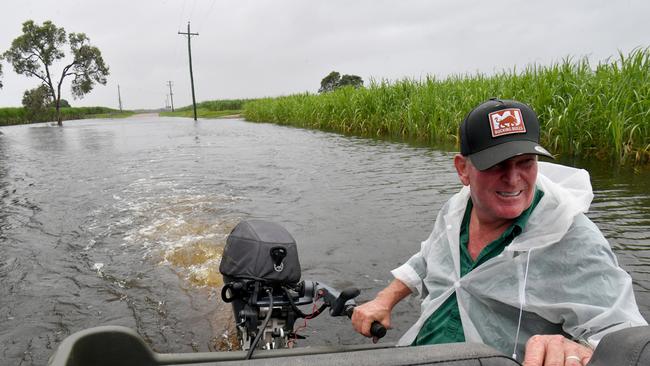 Tuesday February 12.. Heavy rain causes flooding in North Queensland. Groper Creek, near Home Hill cut off by flooding. Peter Collings from Dizzdale with his Argo on the road out of Groper Creek. Picture: Evan Morgan