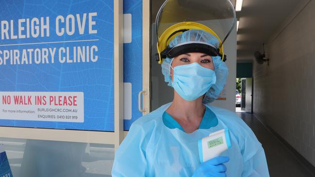 Free testing is available at the Burleigh Cove Respiratory Clinic, pictured is registered nurse Angel Anderson in her PPE at the centre. Picture Glenn Hampson