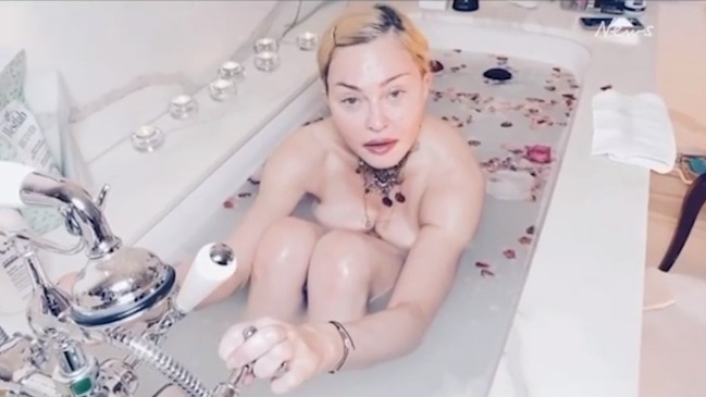 Madonna Posts Topless Selfie With Louis Vuitton Handbag