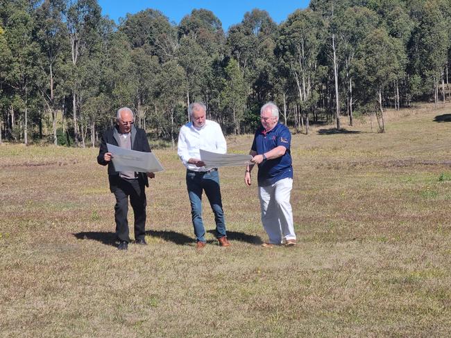 Chris Gulaptis look over the plans for the South Grafton housing project with CEO of North Coast Community Housing, John  McKenna (right) and one of the Directors of North Coast Community Housing, Phil Belletty who is based in the Clarence Valley.