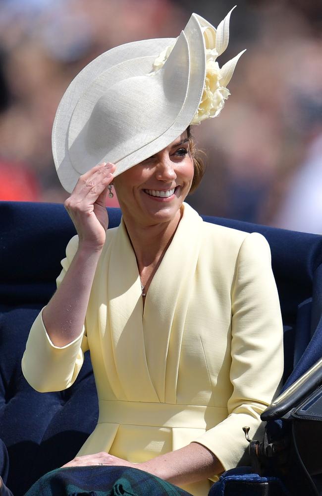 Britain's Catherine, Duchess of Cambridge smiles as she returns to Buckingham Palace after the Queen's Birthday Parade, 'Trooping the Colour', in London. Picture: AFP