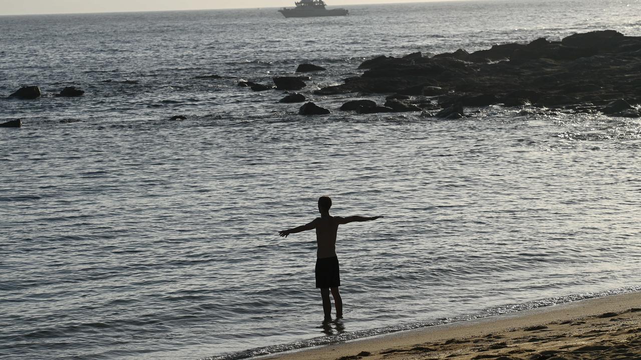 A lone swimmer at the headland at Little Bay today. Picture: NCA NewsWire / Jeremy Piper