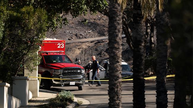 Law enforcement officials investigate a potential ignition point of the Palisades Fire near the Skull Rock trailhead on January 14. Picture: Justin Sullivan/Getty Images/AFP