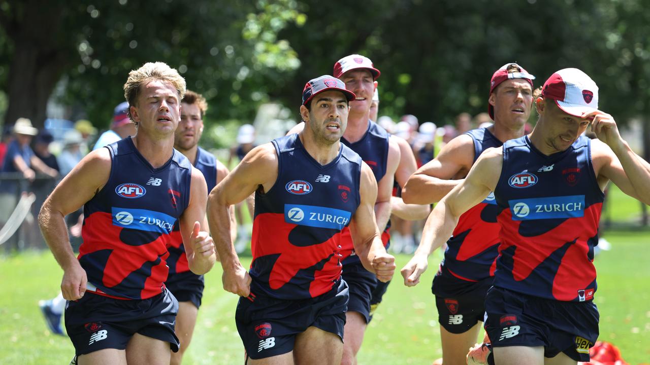 Christian Petracca (centre) during sprint training in the heat. Picture: David Caird.