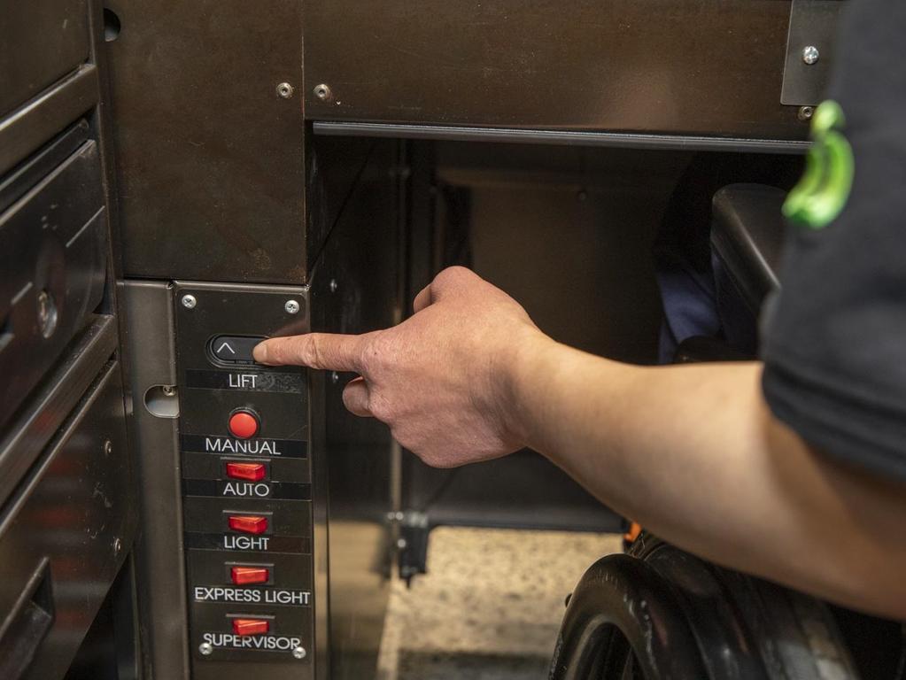 The checkout is designed for staff using wheelchairs or mobility aids. Picture: Dallas Kilponen/Woolworths