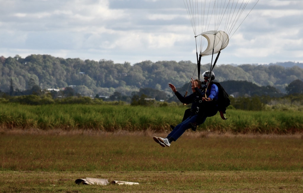 Bob Sherwell, who is about to turn 87, shares his second charity skydive with Pastor Joel Baker, of Flametree Baptist Church.