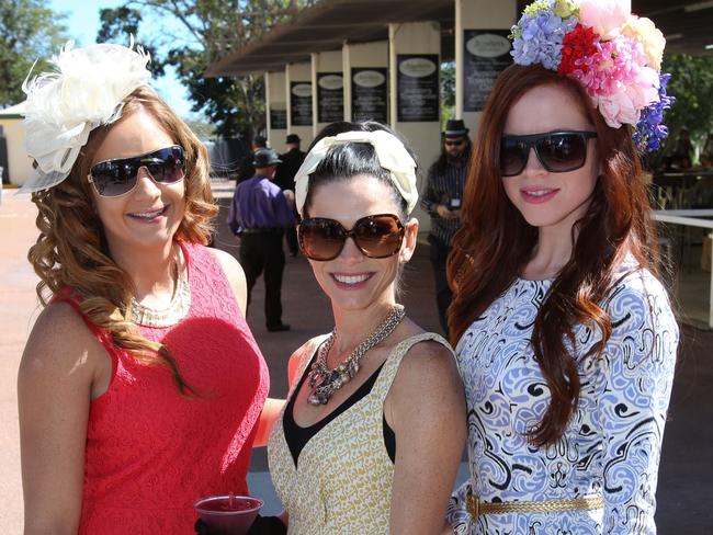 Ladies Day at Cluden Park Racecourse. 21/07/2012. Picture: Michael Chambers. Lisa Newman, Kirsty Thompson and Naomi Collings.