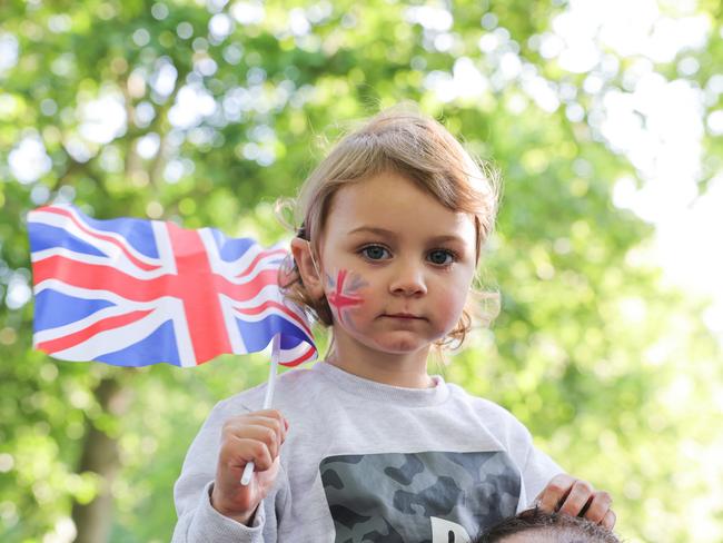 It’s on for young and old, proudly waving the Union flag. Picture: Getty Images