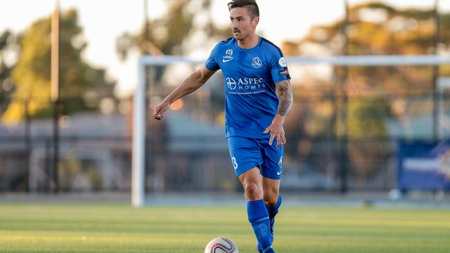 Off-season recruit Matthew Halliday was a standout at the heart of Adelaide Olympic’s defence against Adelaide Comets. Picture: Adam Butler