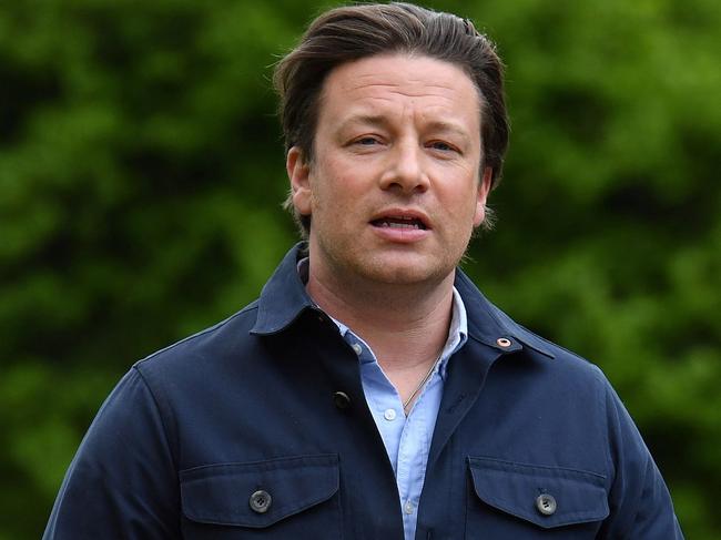 British chef and activist Jamie Oliver is dealing with the collapse of his restaurant empire. Picture: AFP