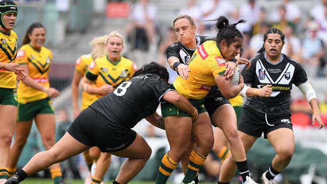 Simaima Taufa on the charge for the Jillaroos against New Zealand. Picture: AAP Image/Dan Himbrechts