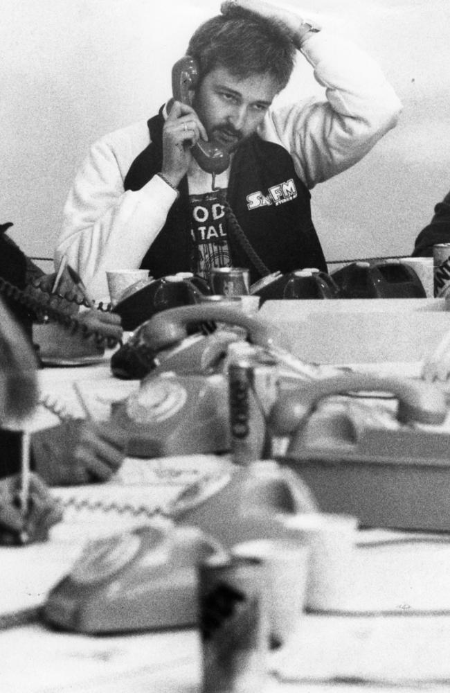 SAFM radio announcer Phil Dowse in the phone room at Channel 9's studio, collecting telephone pledges during the television broadcast of Live-Aid concert from Wembley Stadium in London, 14 Jul 1985.