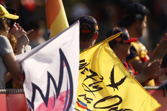 Crows fans watch the round 7 AFLW match between the Melbourne Demons and the Adelaide Crows at Casey Fields in Melbourne