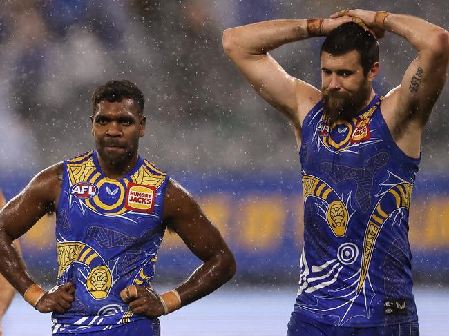 PERTH, AUSTRALIA - JULY 12: Elliot Yeo, Liam Ryan and Josh J. Kennedy of the Eagles look on after being defeated during the round 17 AFL match between the West Coast Eagles and North Melbourne Kangaroos at Optus Stadium on July 12, 2021 in Perth, Australia. (Photo by Paul Kane/Getty Images)