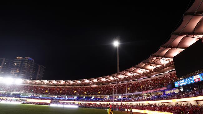 A power fault sends the match between the Brisbane Lions and Melbourne at the Gabba into darkness. Picture: Chris Hyde/Getty Images