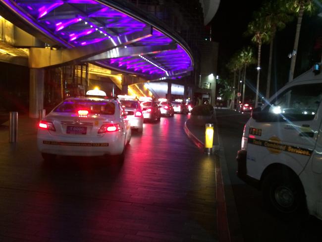 The line of taxis stretches down the road even after 4am.