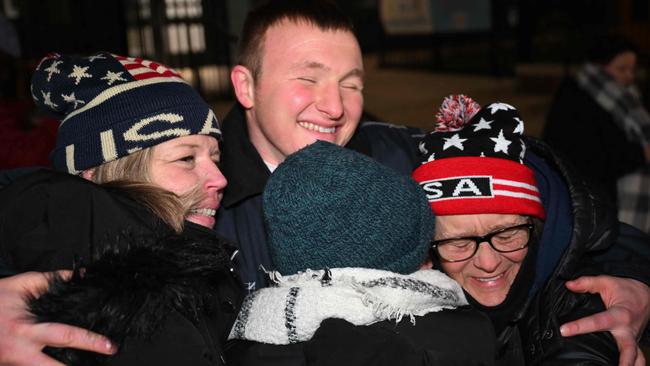 Gregory Purdy, a January 6 defendant, hugs friends he calls his "Patriot sisters" after his release from the DC Central Detention Facility where he was incarcerated for the 2021 attack on the Capitol, in Washington, DC. Picture: AFP